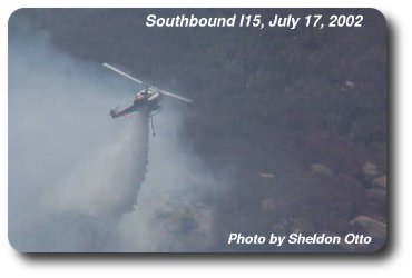 Fire Helicopter Drops Water